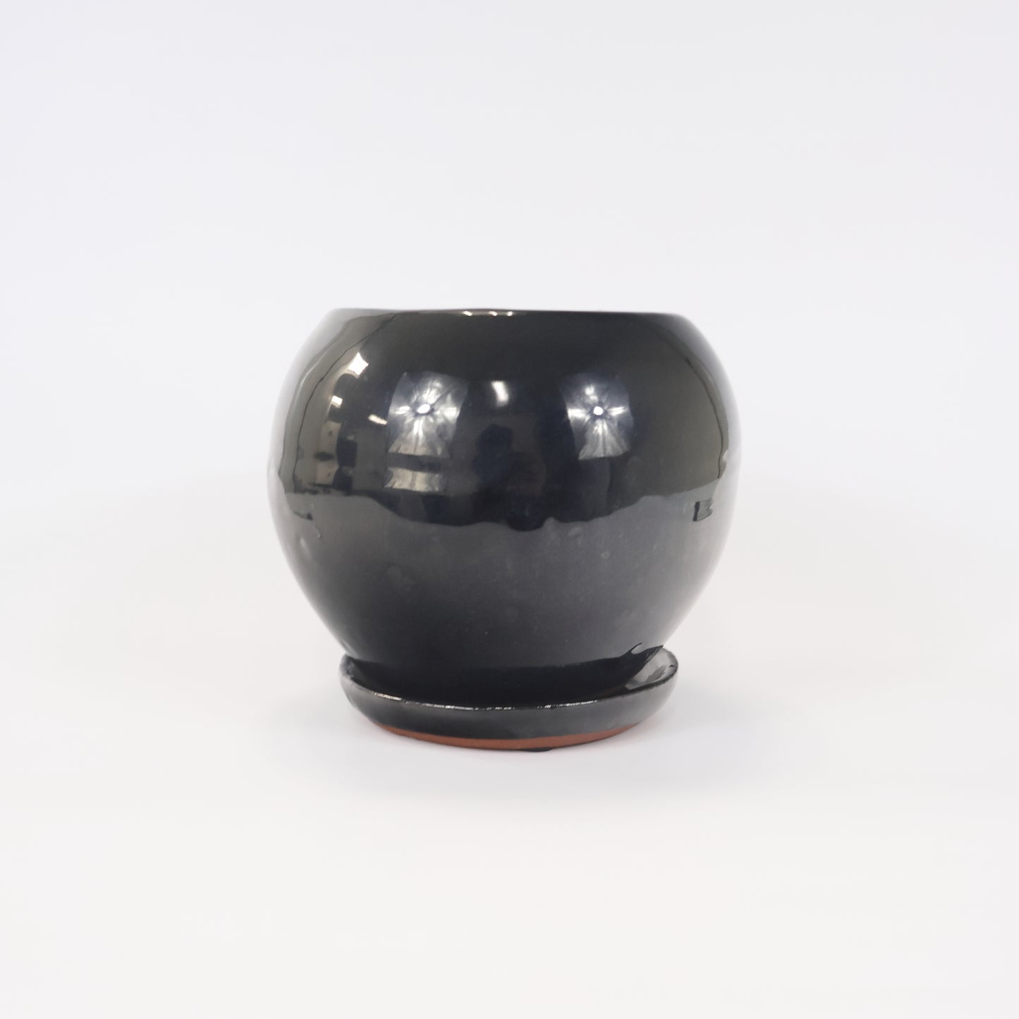 An image of the Glazed Black Rustic Drop ceramic container.