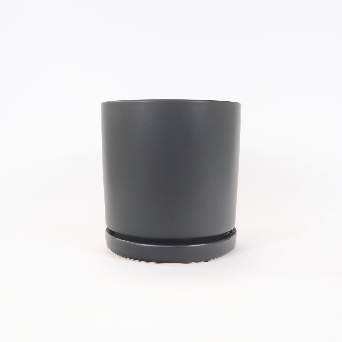 An image of the Matte Black Tall Modern Cylinder ceramic container.