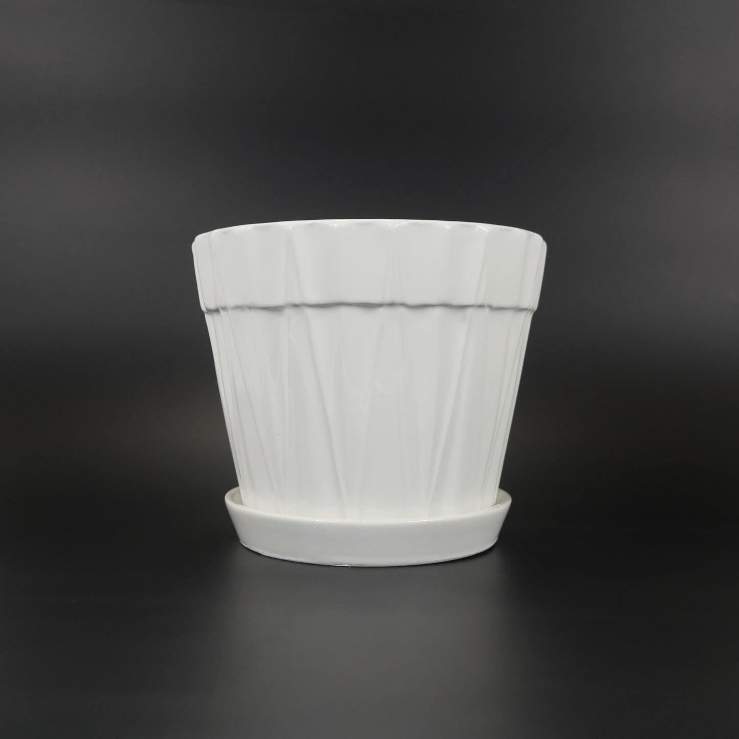 An image of the White Porcelain Triangle design ceramic container.