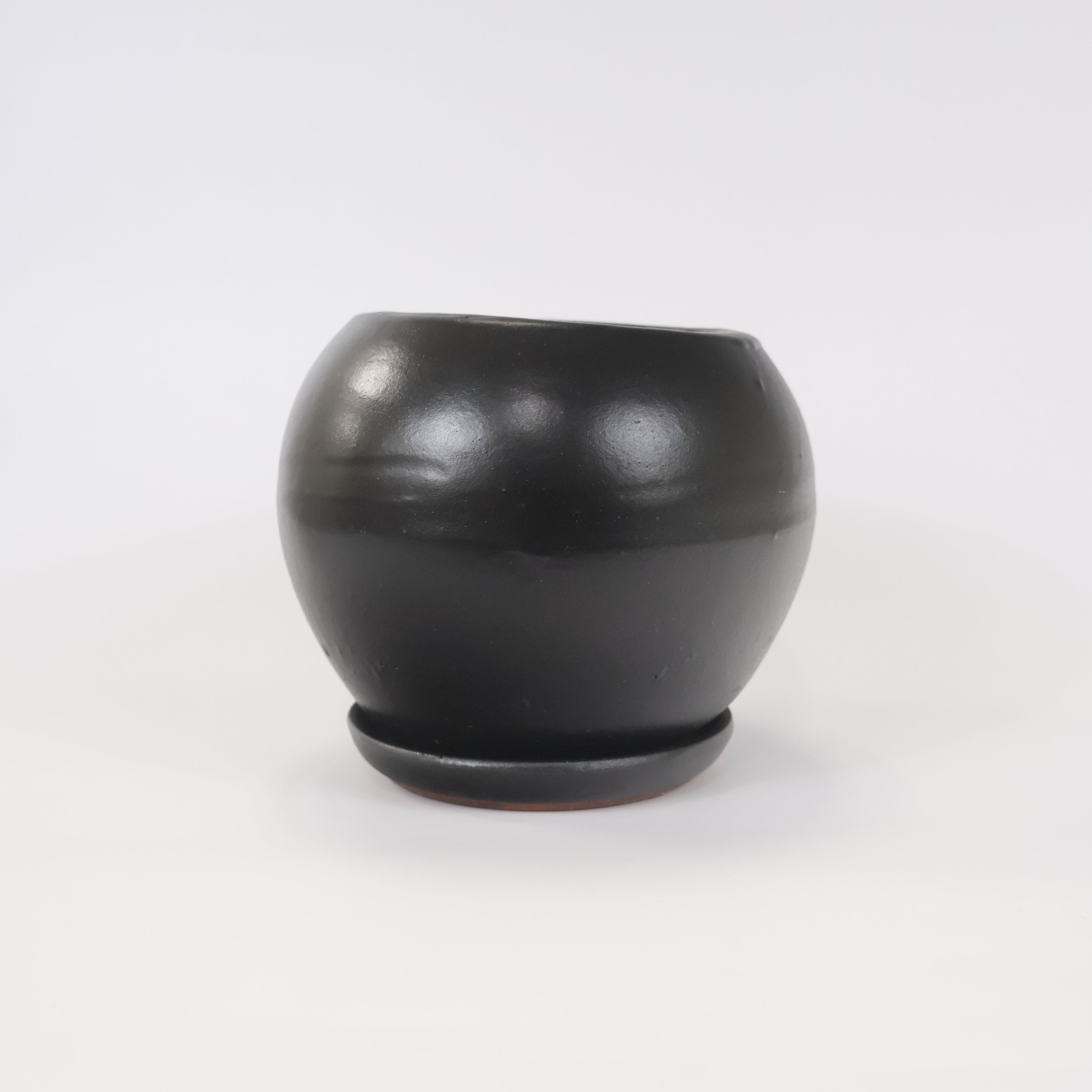 An image of Matte Black Rustic Drop ceramic container.