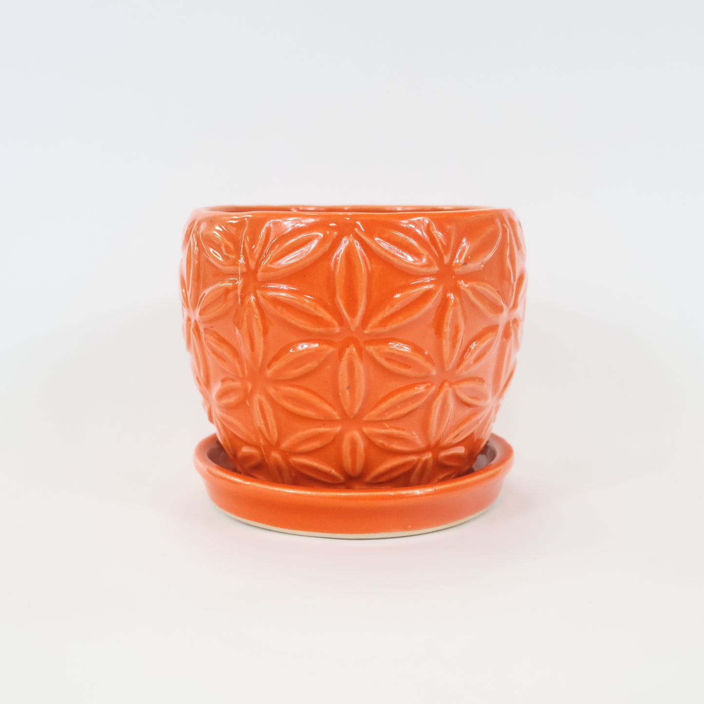 An image of the Orange Floral ceramic container.